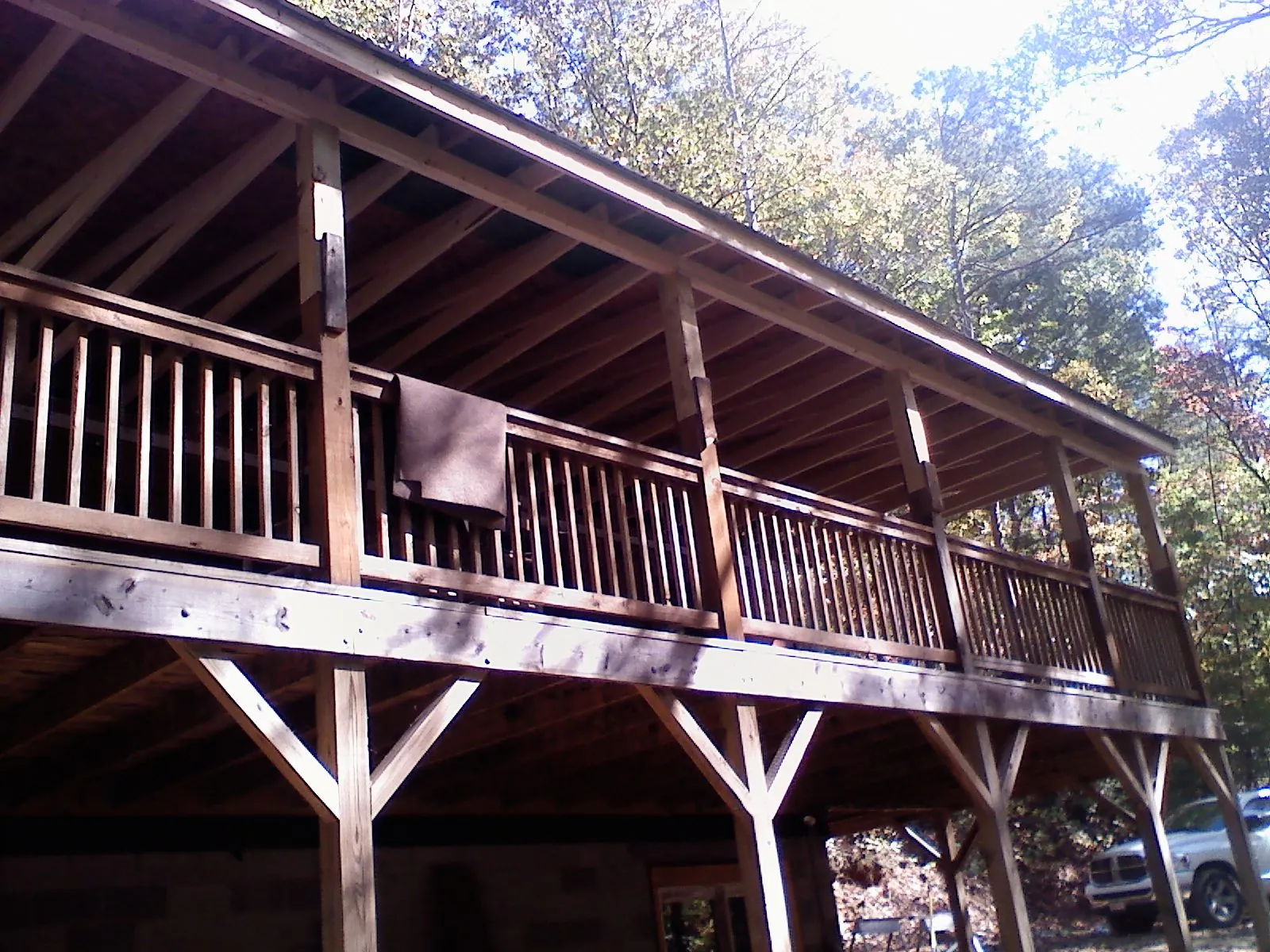 Timber framing under a new elevated porch and deck — Roof Leak Repair in Metaline by Roofing Brothers